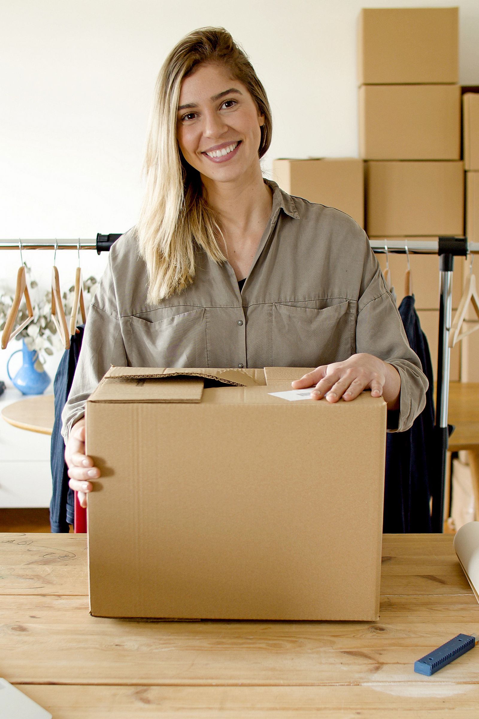 Small business owner holding a parcel